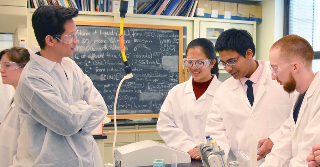 Biotechnology students working in a lab