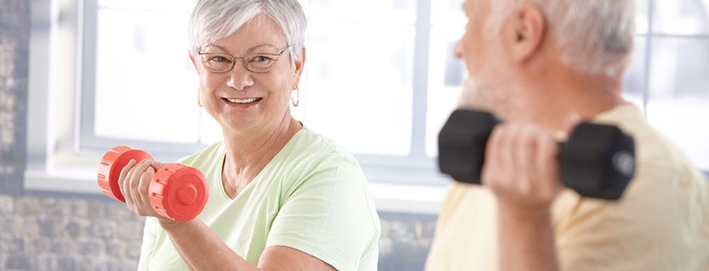 Elderly couple working out