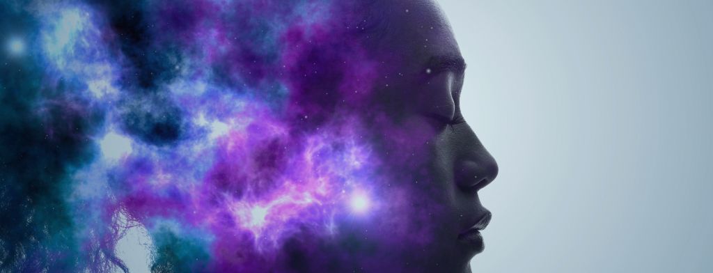 Banner Image - Blue and purple colored clouds bursting from a woman's head