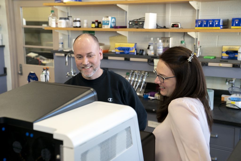 Daniel Hannon and Kerry Hair working with lab equipment