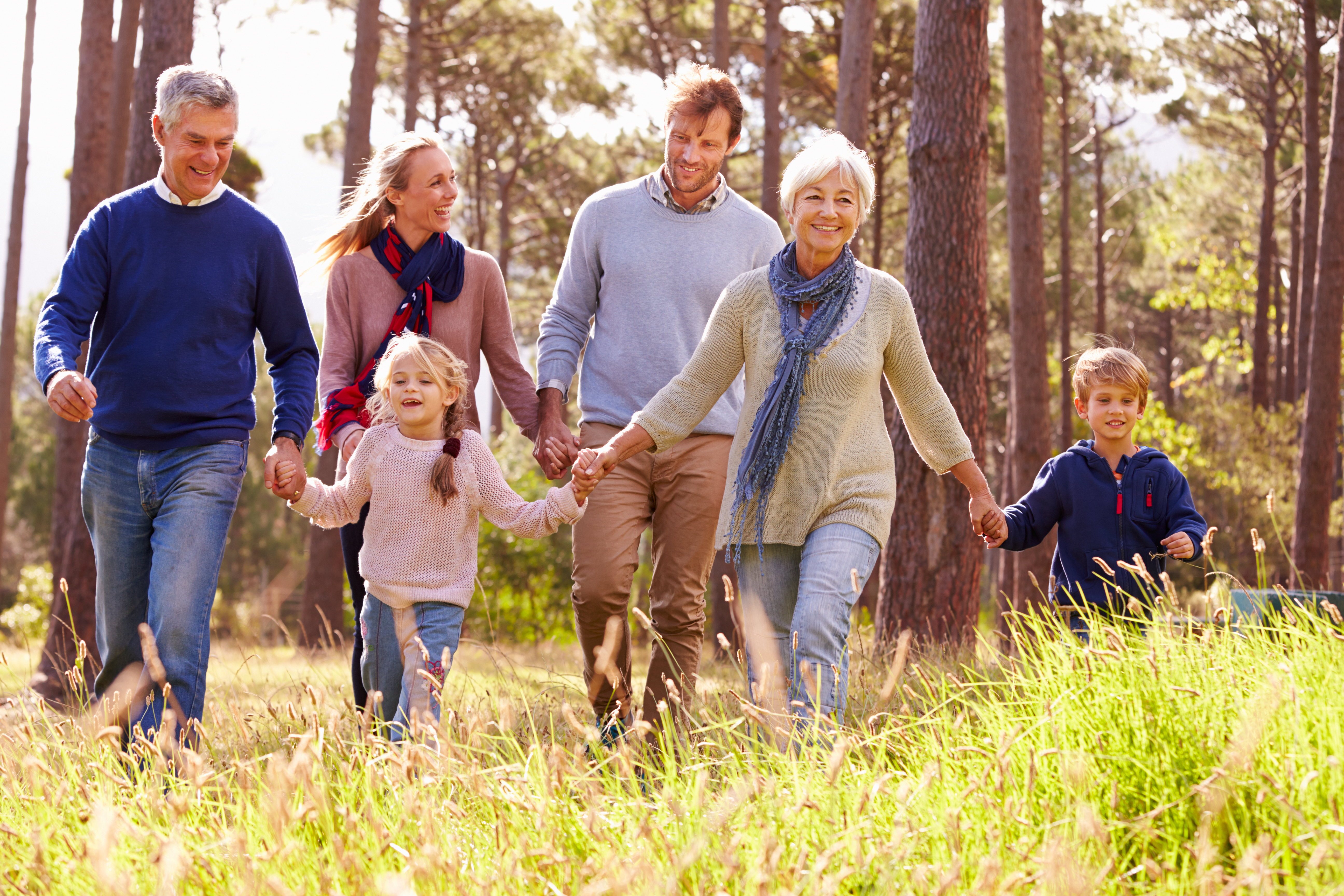 Multiple generations of a family enjoying a hike