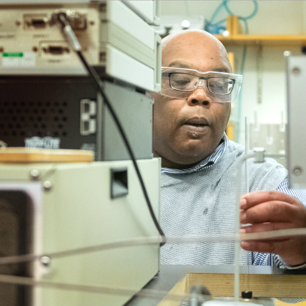 Biochemist Squire Booker, a member of the National Academy of Sciences and Penn State's only Howard Hughes Investigator, studies how reactions catalyzed by radical SAM enzymes work. His lab uses the instrument shown here, an electron paramagnetic resonance spectrometer, to analyze iron-sulfur clusters on the enzymes. Disruptions in radical SAM enzymes can lead to serious health problems including Type II diabetes, congenital heart disease, ALS, and increased susceptibility to viral infection. IMAGE: PATRICK MANSELL