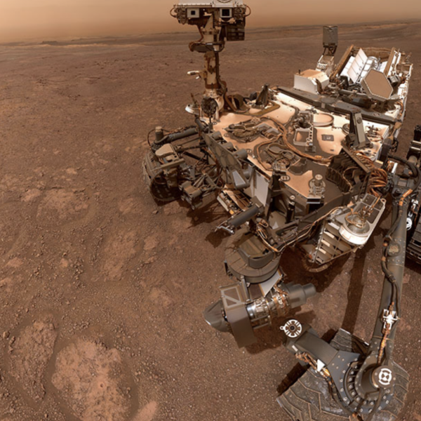 A selfie taken by NASA's Curiosity Mars rover on Sol 2291 at the "Rock Hall" drill site, located on Vera Rubin Ridge. Reduced carbon released from powder from this drill hole was strongly depleted in carbon 13, the surprising carbon isotopic signature reported by the team. The selfie is composed of 57 individual images taken by the rover's Mars Hand Lens Imager (MAHLI), a camera on the end of the rover's robotic arm. Credit: NASA/Caltech-JPL/MSSS. All Rights Reserved.