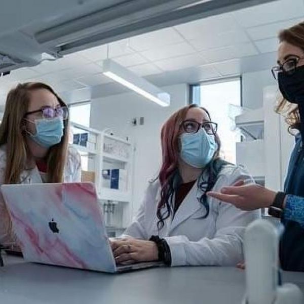 Two graduate students in Penn State’s Department of Animal Science, Sophia Kenney, left, and Emily Van Syoc, center, have received recognition for their research. They are shown with Erika Ganda, assistant professor of food animal microbiomes. Credit: Contributed photo. All Rights Reserved.