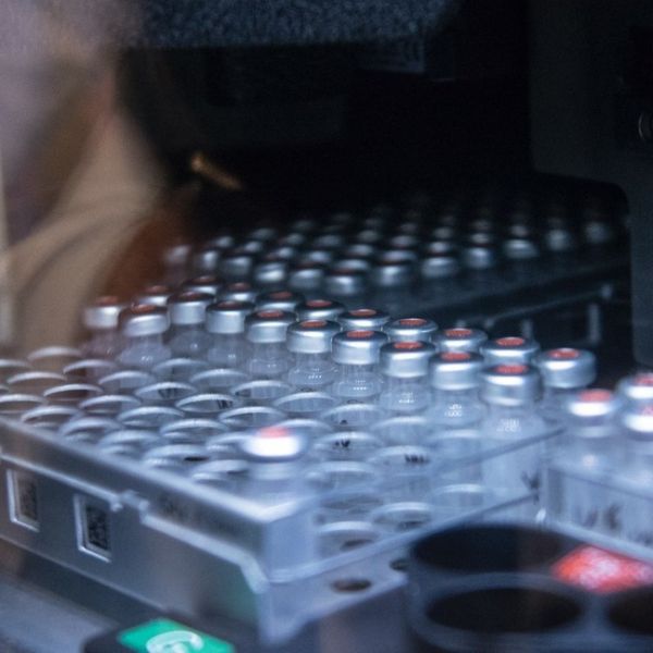 In the Metabolomics Core Facility, vials filled with extracts of bodily fluid wait in an auto-sampler. Each sample will be passed through a chromatography system that sorts the complex sample into its constituents. Droplets of the separated sample are then misted into the mass spectrometer for analysis.IMAGE: PATRICK MANSELL