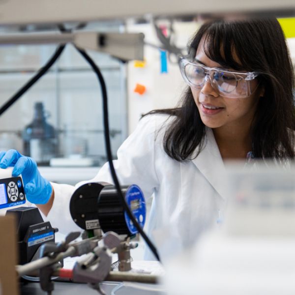 This is a photo of Erha Andini in her laboratory.