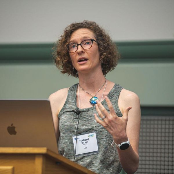 Penn State alumna and NIH scientist Martha Nelson gave a presentation about transmission of the SARS-CoV-2 virus among deer and humans at the 2023 Ecology and Evolution of Infectious Disease conference held at Penn State in May. Credit: Michelle Bixby / Penn State. Creative Commons