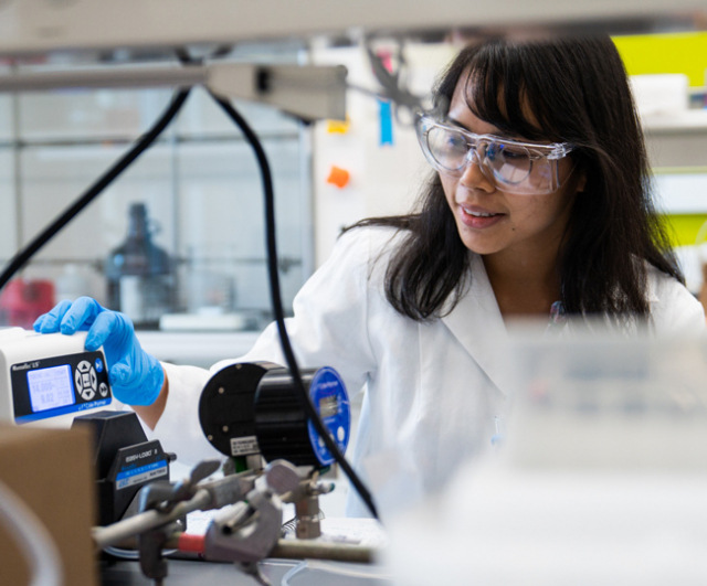 This is a photo of Erha Andini in her laboratory.