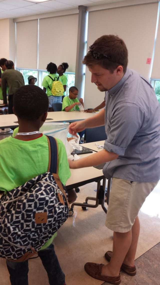 MCIBS students volunteering with Science Outreach
