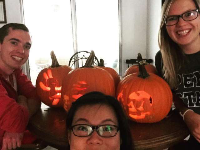 MCIBS students carving pumpkins